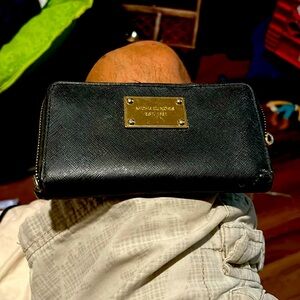 Michael Kors female wallet used decent condition
